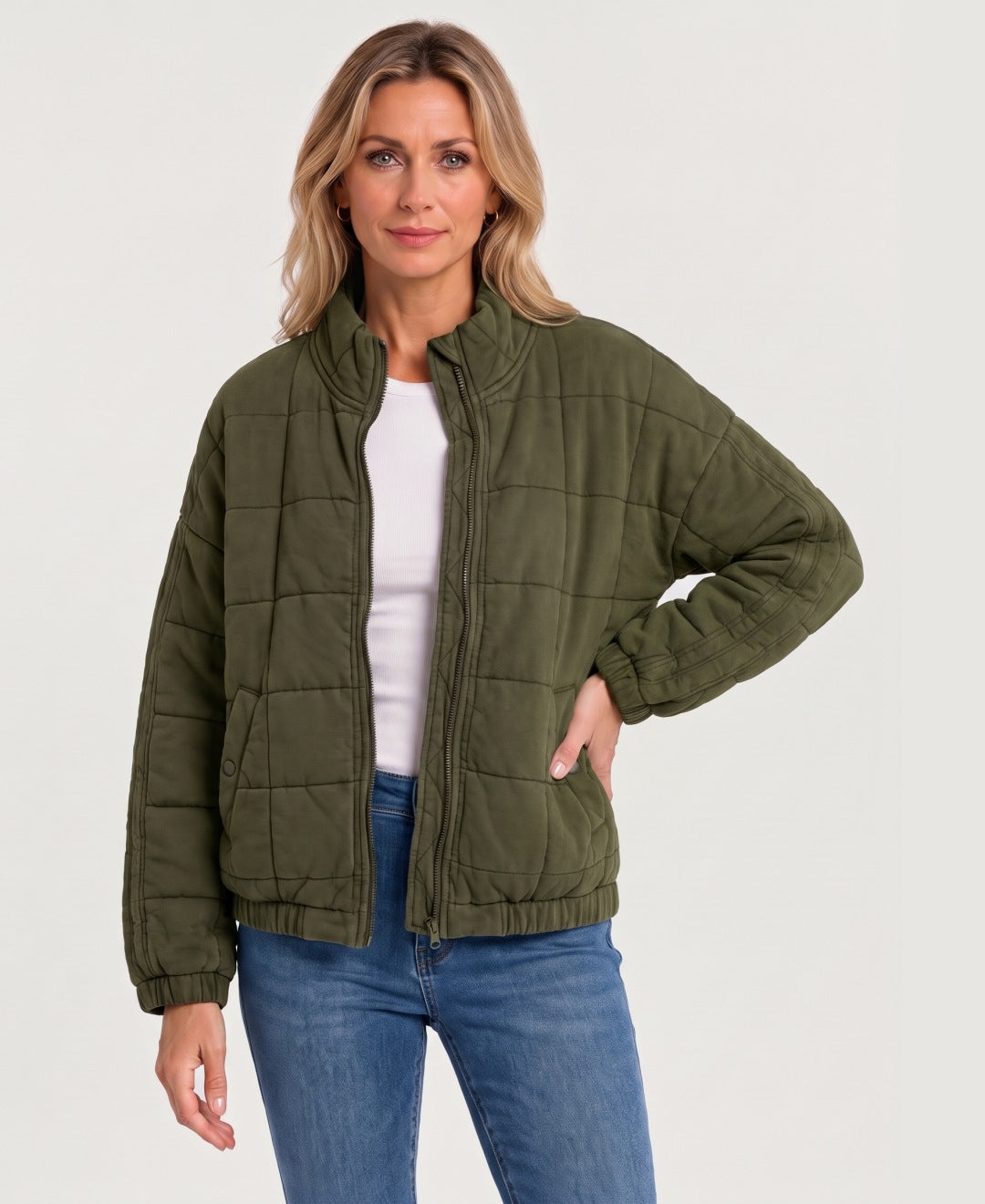 Women's quilted zip-up jacket olive green front view