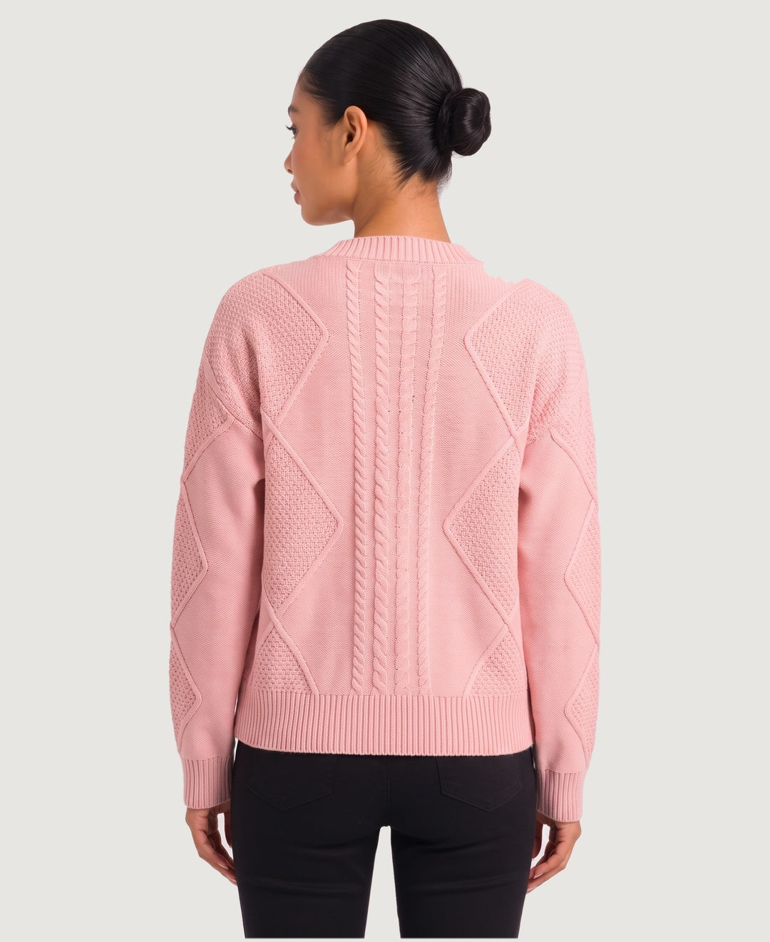 Women's diamond cable knit V-neck button cardigan in pink, back view