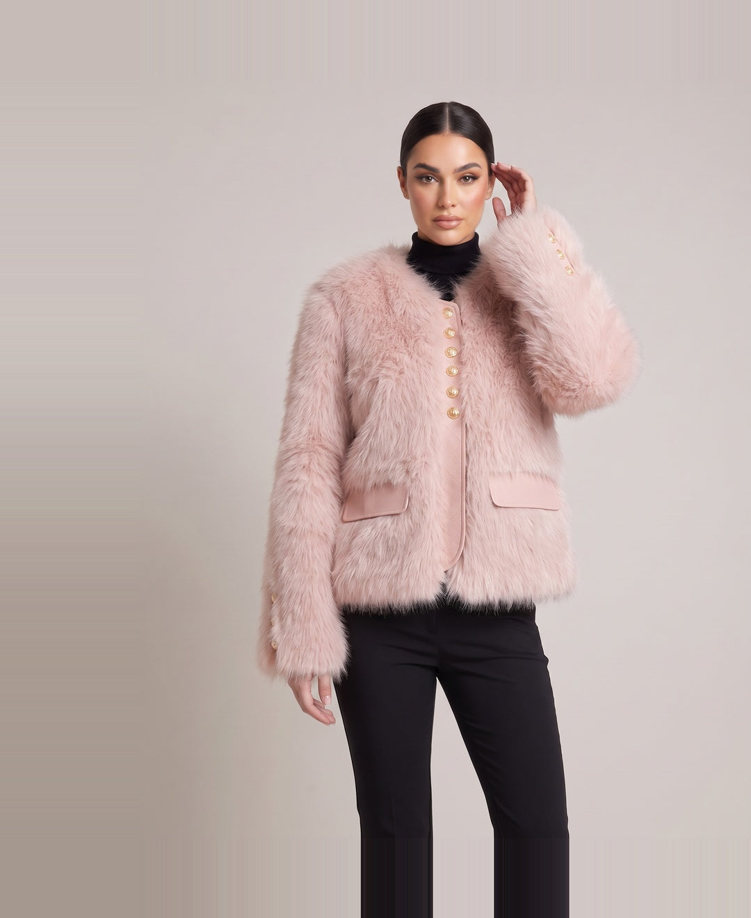 Women's cropped faux fur jacket in pink, front view