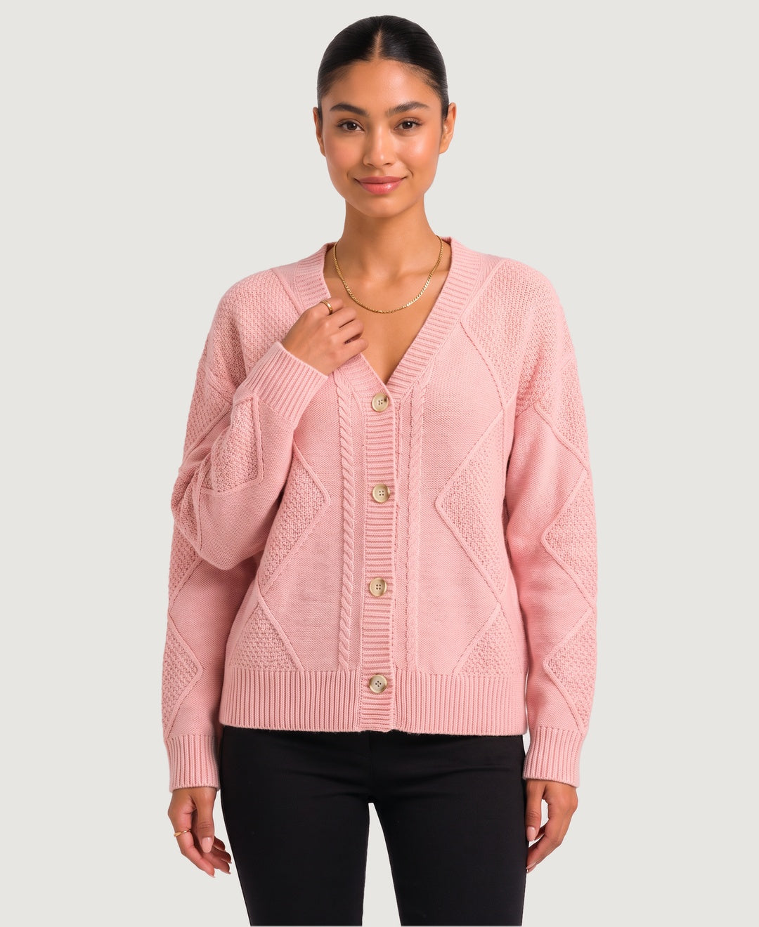 Women's diamond cable knit V-neck button cardigan in pink, front view