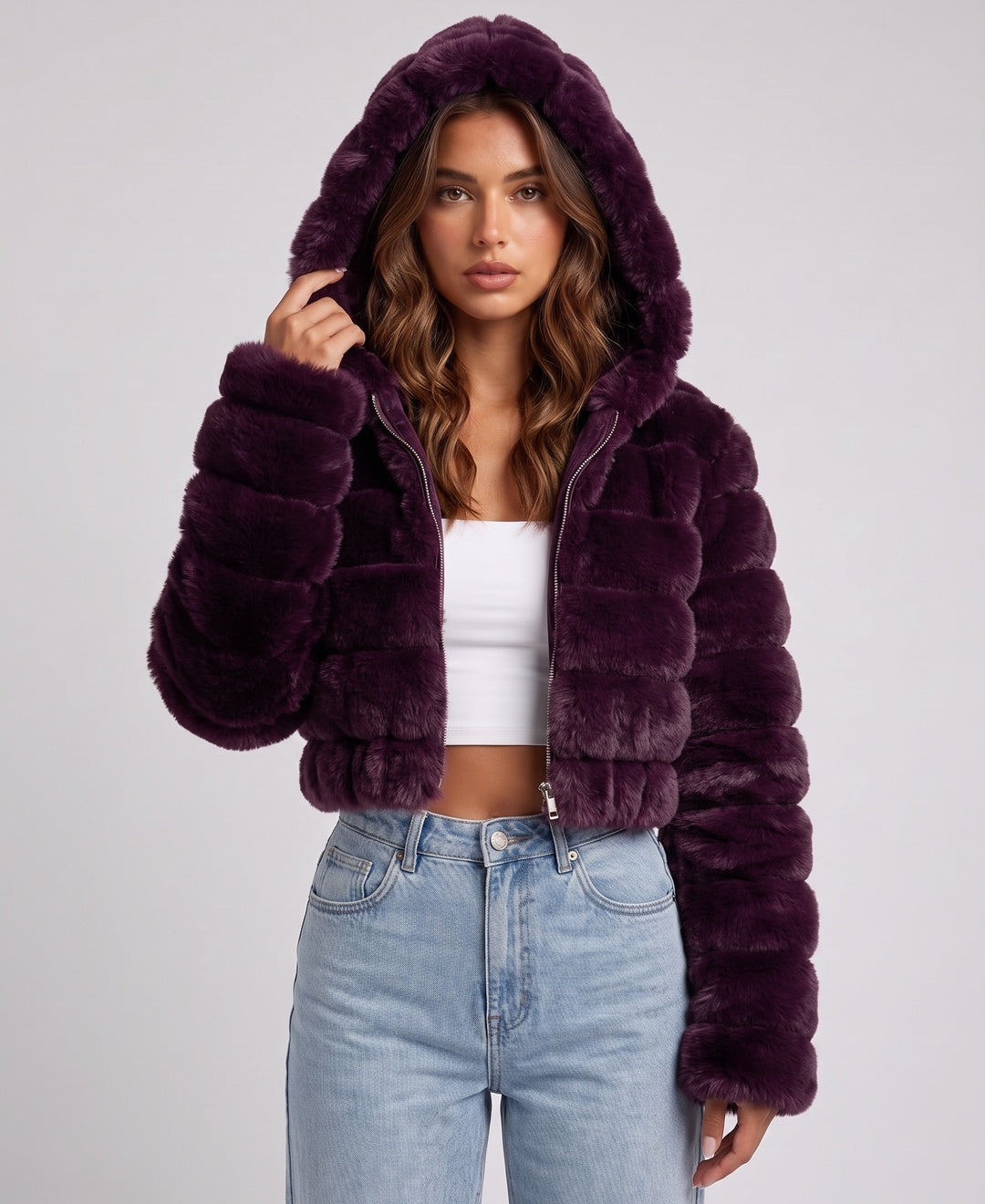 Women's cropped faux fur hooded bomber jacket in deep purple, front view