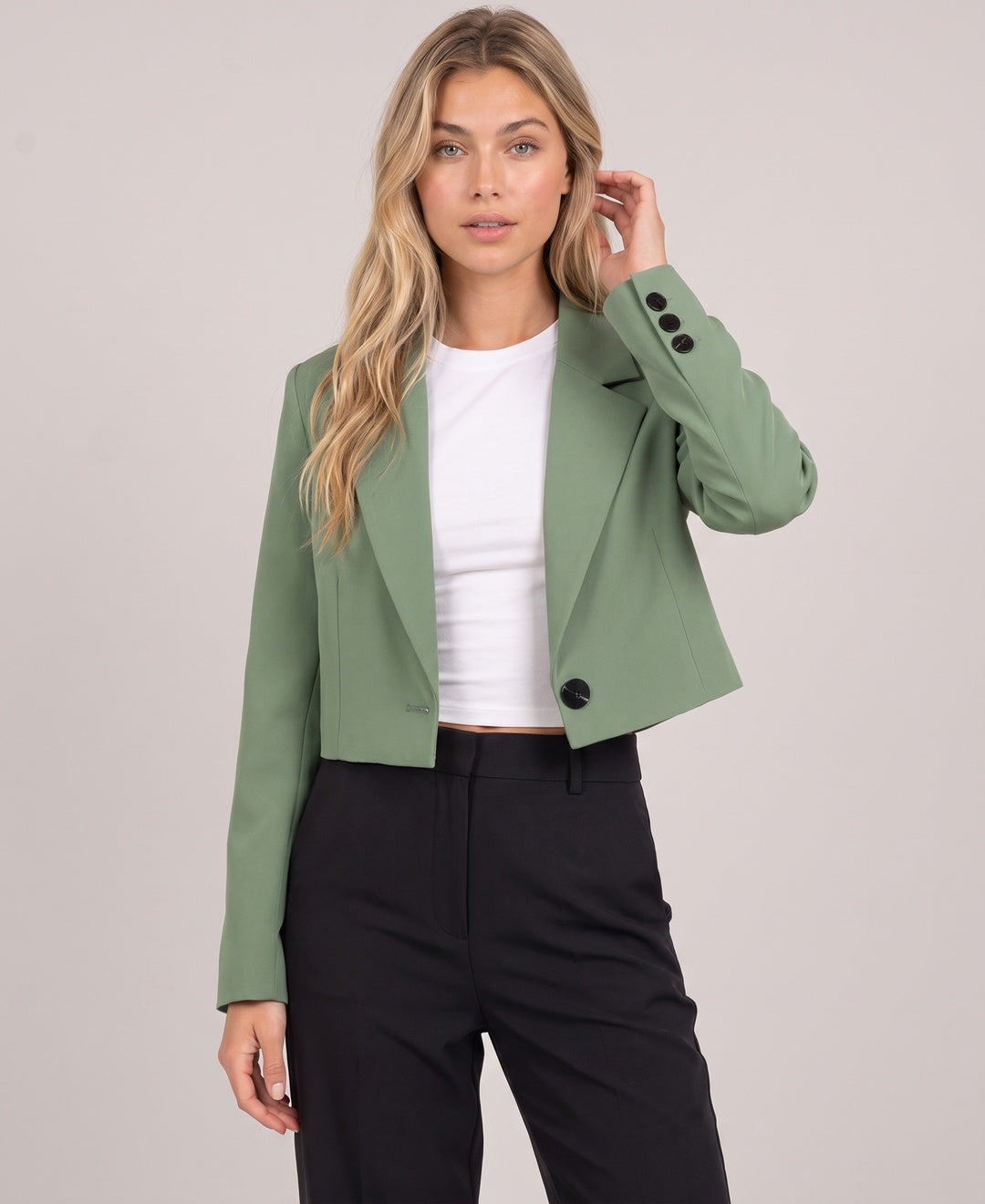 Women's cropped blazer in sage green, front view