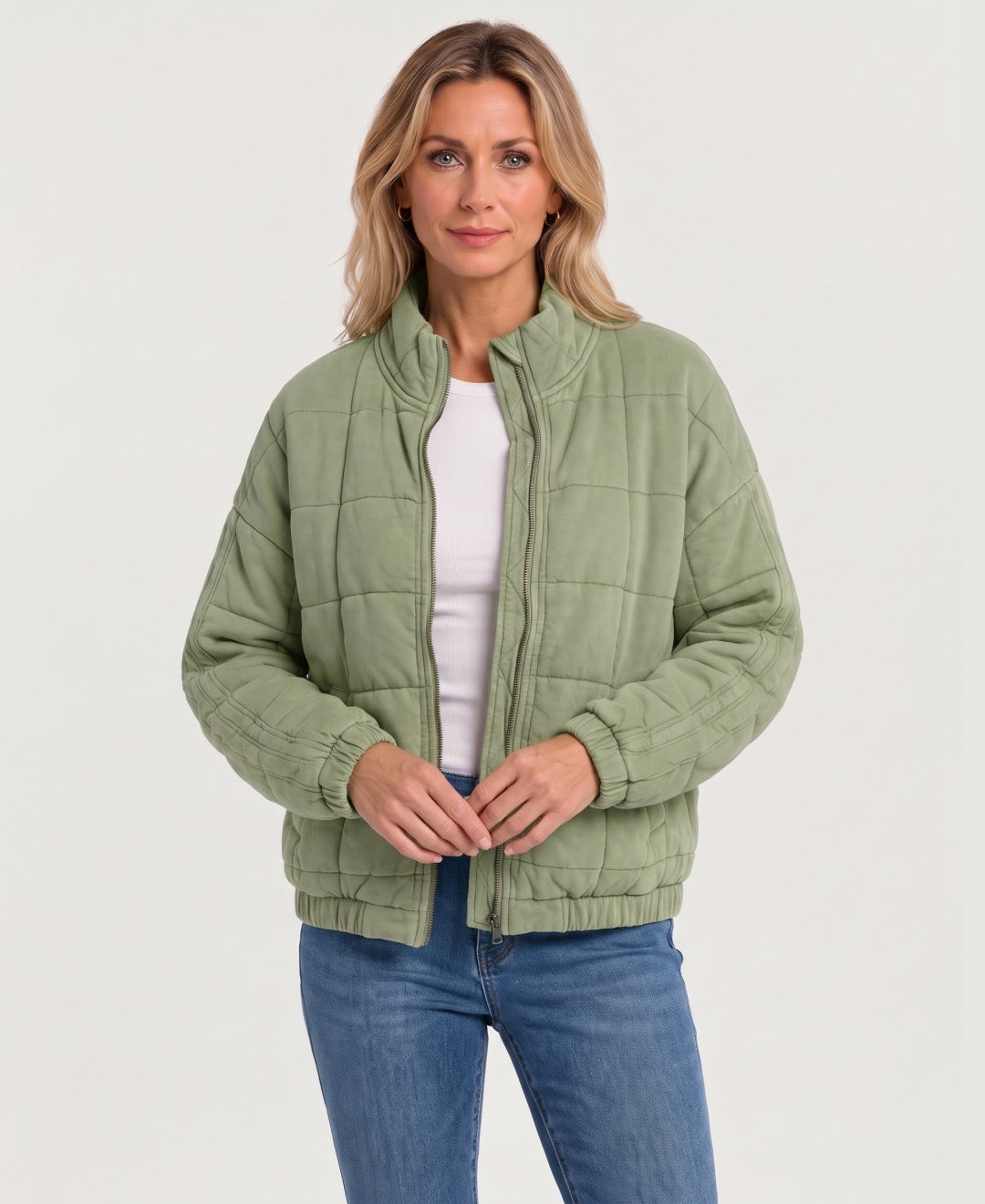 Women's quilted zip-up jacket sage green front view