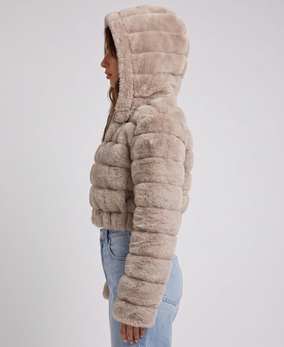 Women's cropped faux fur hooded bomber jacket in beige, side view
