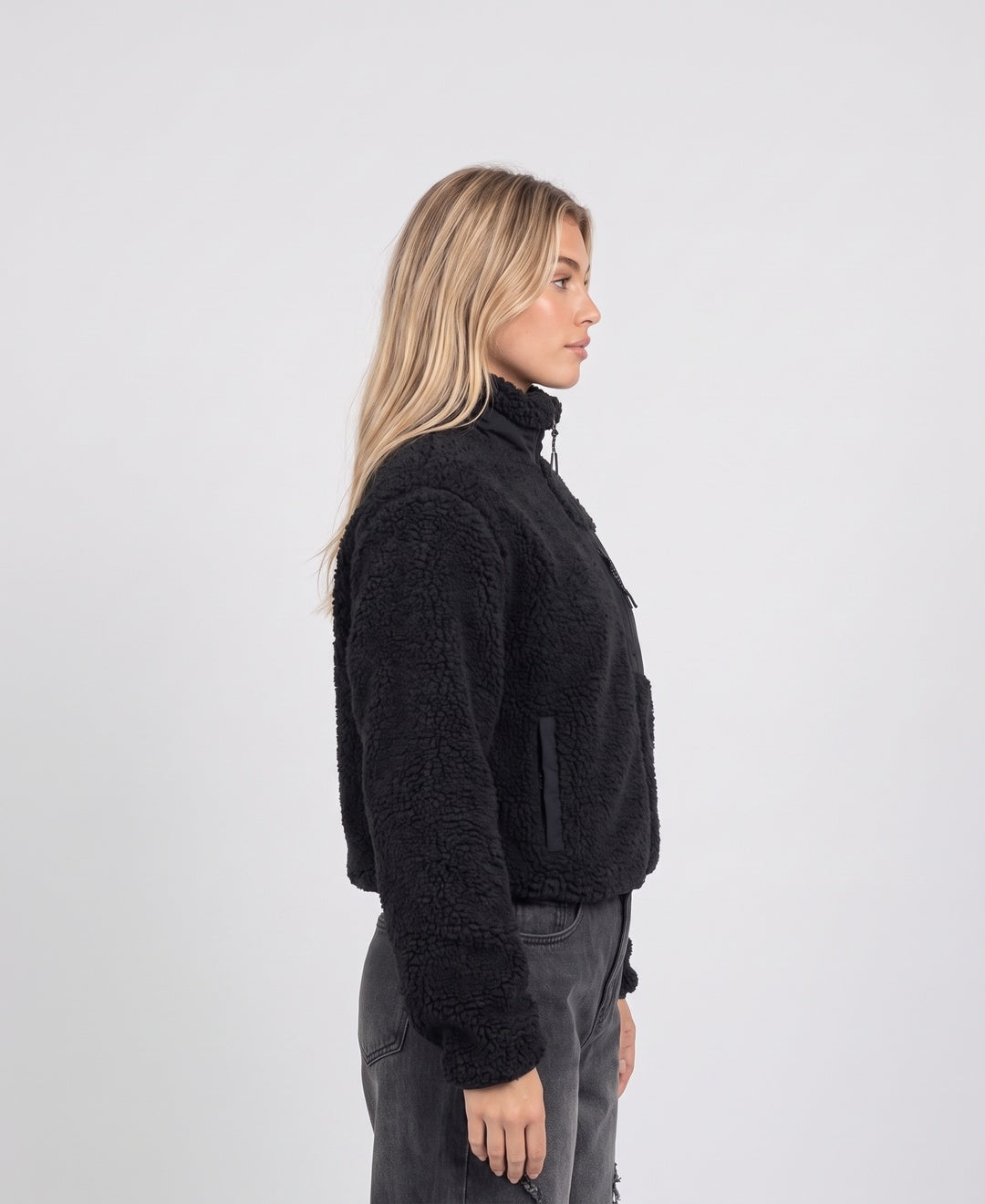 Women's teddy fleece zip jacket in black, side view
