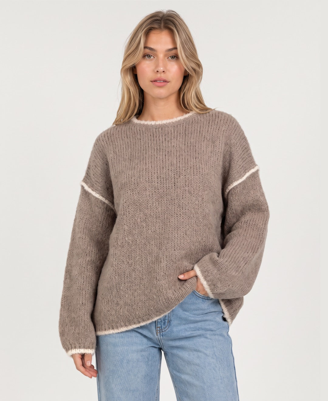 Women's oversized crew neck knit jumper with contrast edging in taupe, front view