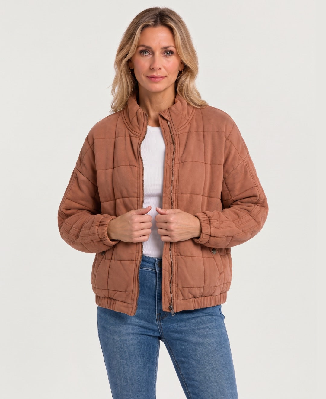Women's quilted zip-up jacket terracotta front view